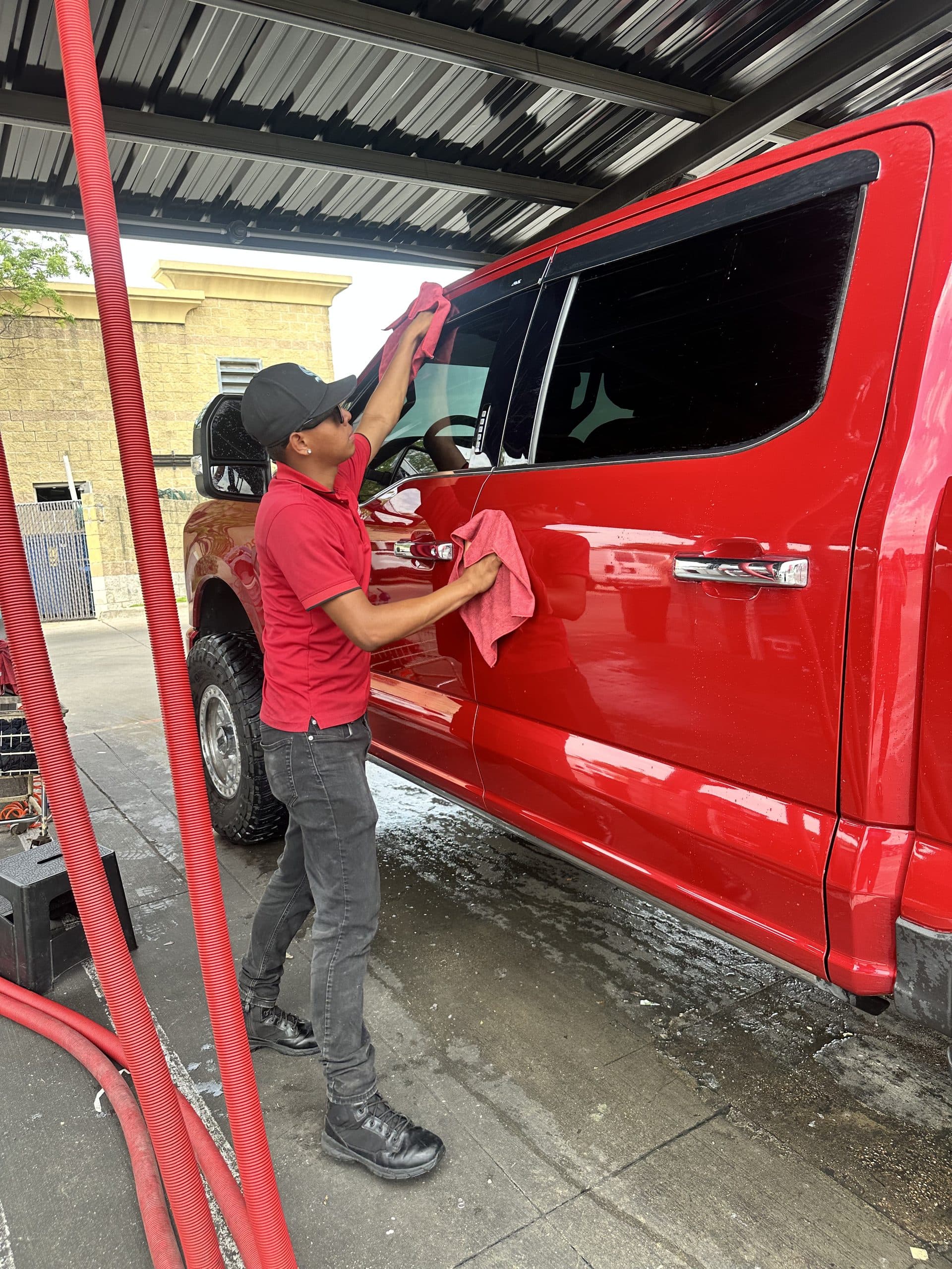 Drying a Ford F-150 under the covered detail bays